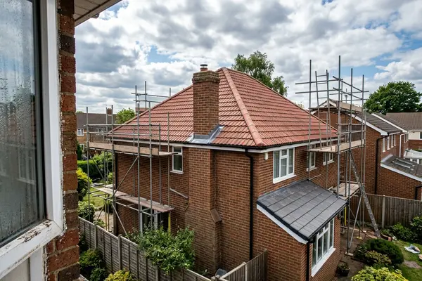 Illustration of a new roof being fitted