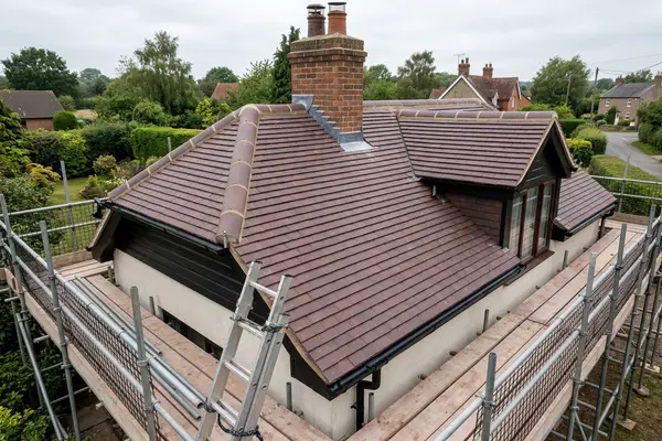 Illustration of a new roof being fitted